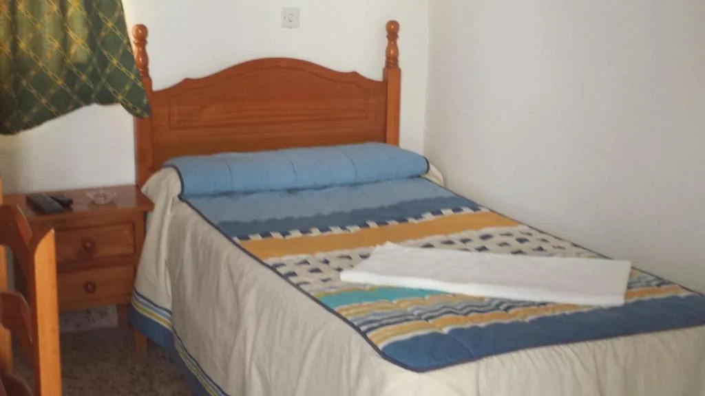 Single Room with Shared Bathroom — Pension Gran Plaza