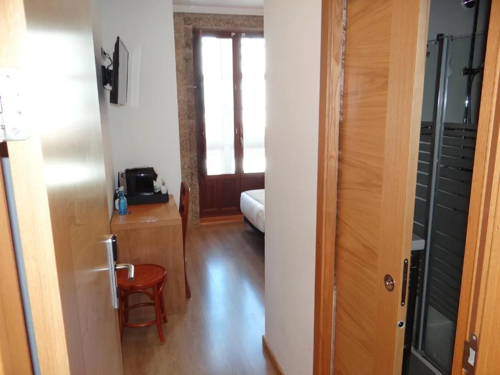 Habitación Doble - 2 camas — Pensión O Códice by Moradas Nieto