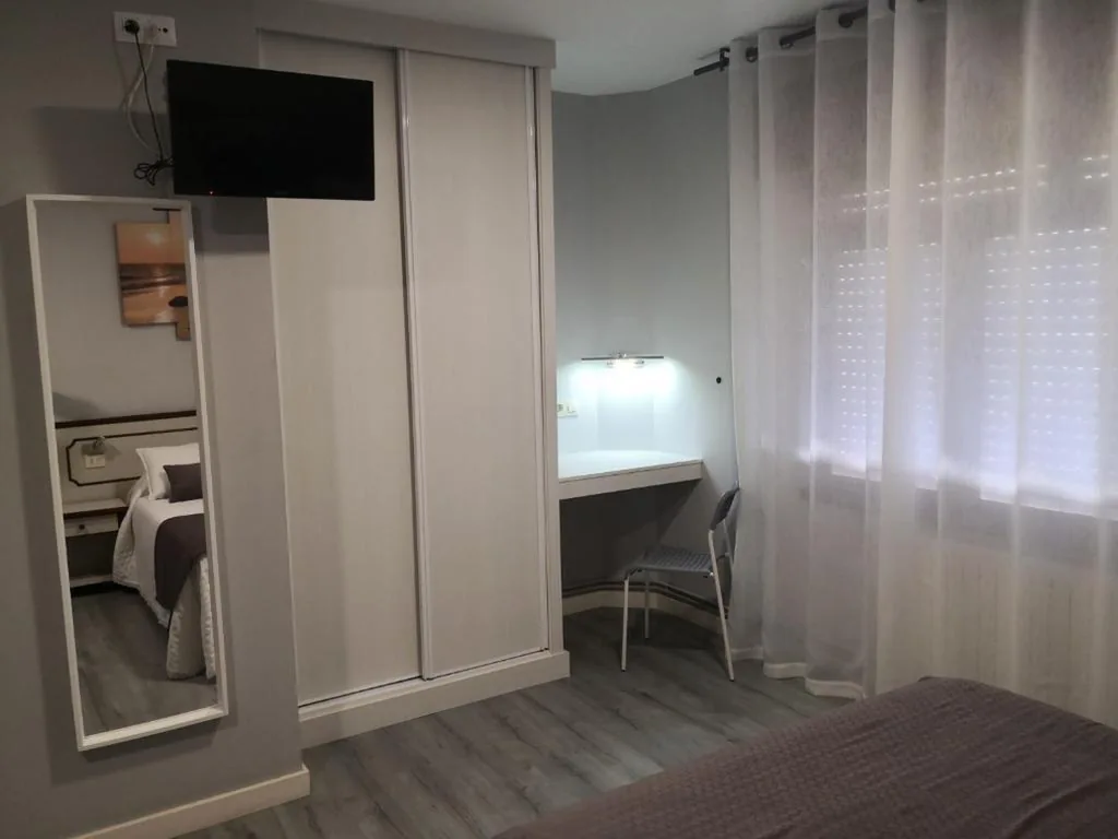 Dreibettzimmer — Pensión Plaza
