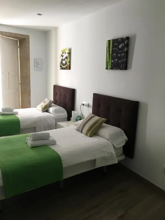 Doppelzimmer mit Gemeinschaftsbad – 2 Einzelbetten — Pensión Residencia Fonseca