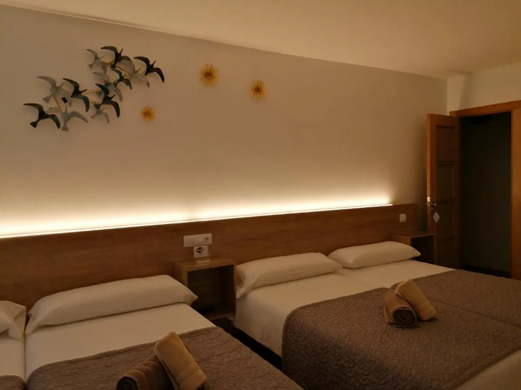 Camera tripla con bagno privato — PENSION ROSELLA
