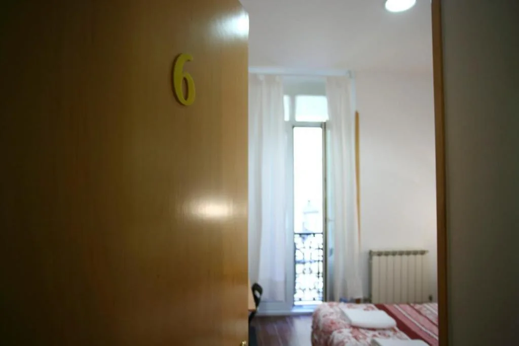 Tweepersoonskamer met gedeelde badkamer — Pensión San Telmo / San Juan