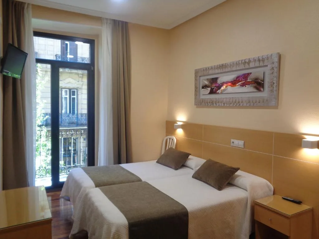 Chambre double extérieure avec 2 lits — Pensión Urumea