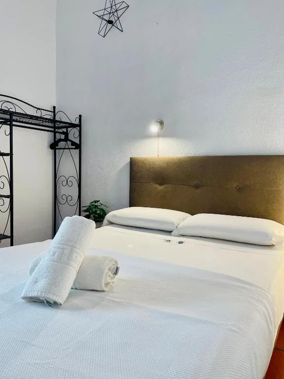Habitación Cuádruple con balcón — Pension Venecia Gomerez