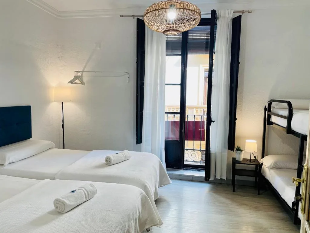 Habitación Cuádruple con baño compartido — Pension Venecia Gomerez
