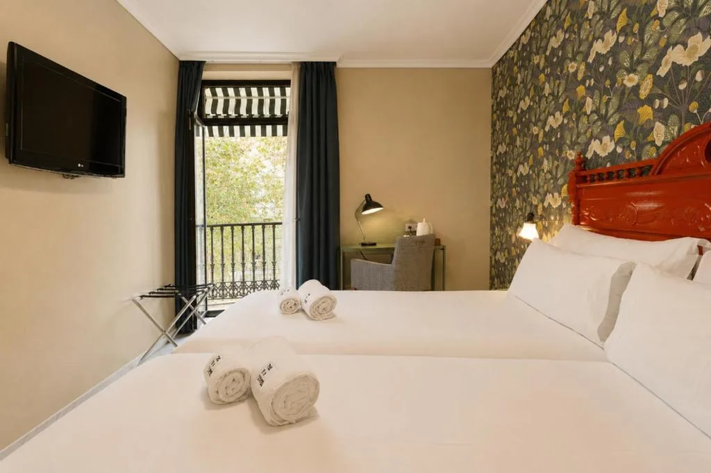 市街の景色を望むダブルルーム — Petit Palace Puerta de Triana