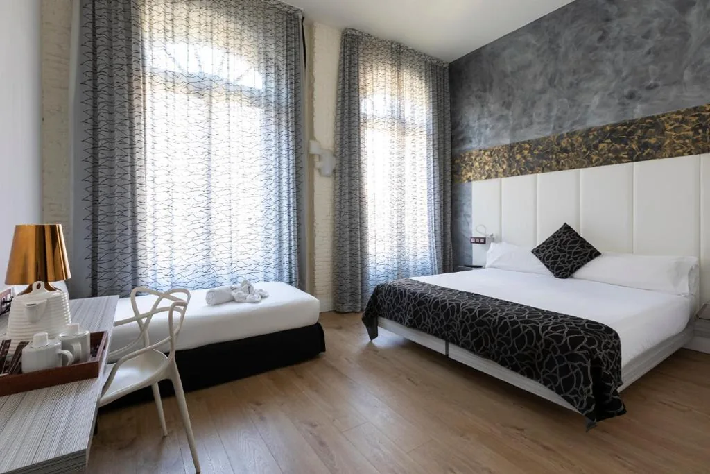 Quarto Triplo — Petit Palace Savoy Alfonso XII