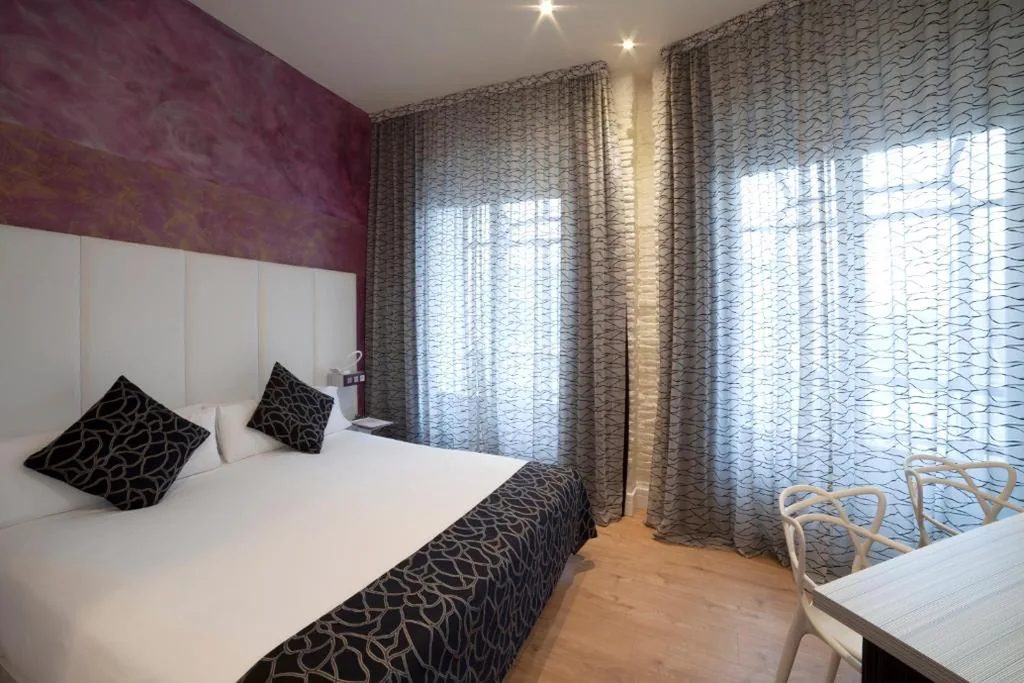 Suite Júnior (4 adultos) — Petit Palace Savoy Alfonso XII