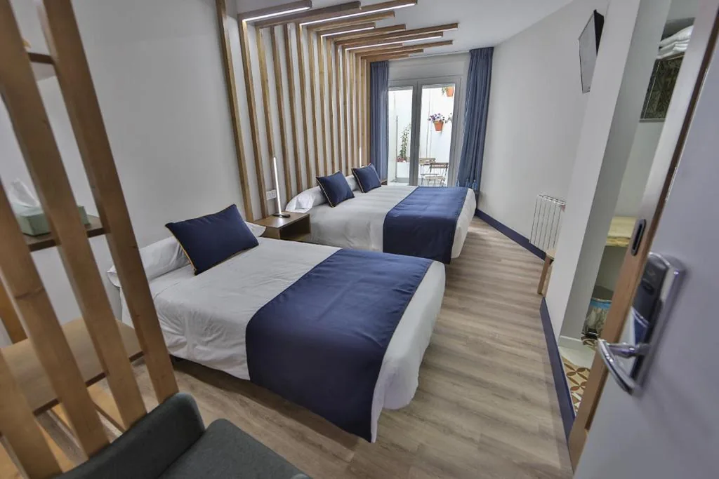 Triple Room with Patio View — Playa de Camariñas