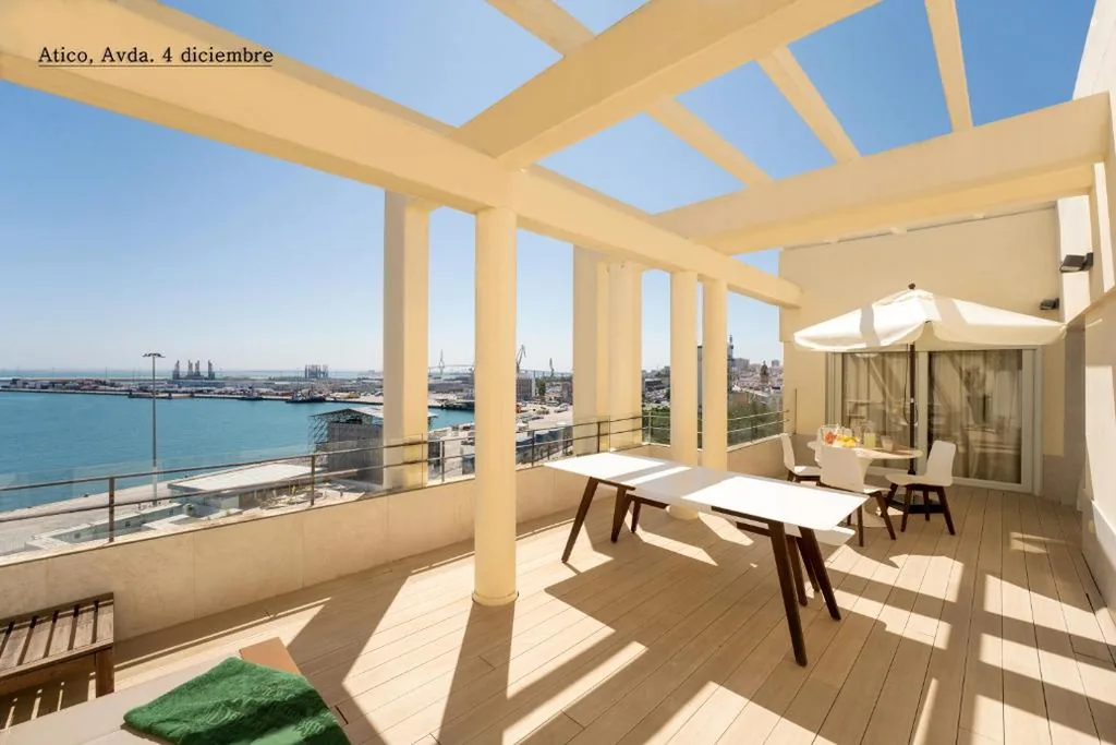 Luxury Two-Bedroom Penthouse with Private Terrace at Avenida 4 de diciembre de 1977, building 26-27 — Plaza Mina Suites by Luxury Suites Cadiz -Adults Recommended