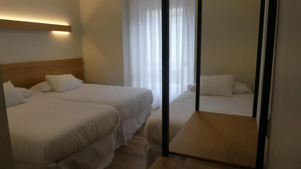 Habitación Triple — Plaza Pombo B&B - Hostal