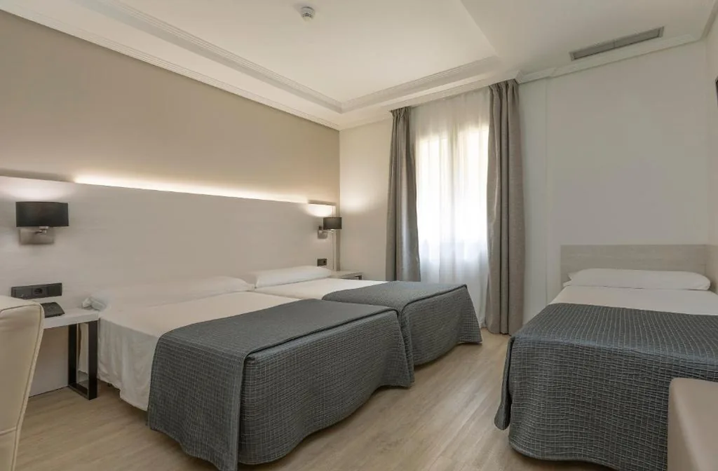 Habitación Triple (2 adultos + 1 niño) — Porcel Ganivet