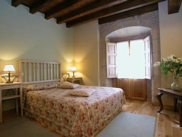 Habitación Cuádruple Clásica — Posada de Peredo y Villa