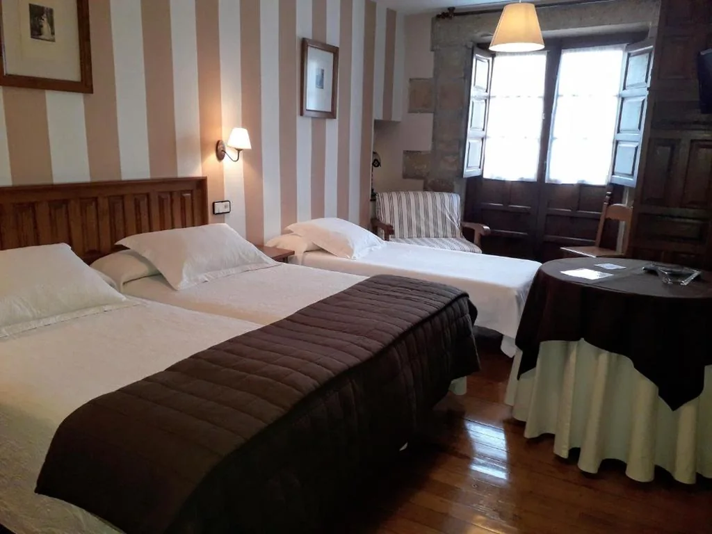 Quarto Triplo — Posada Santa Juliana