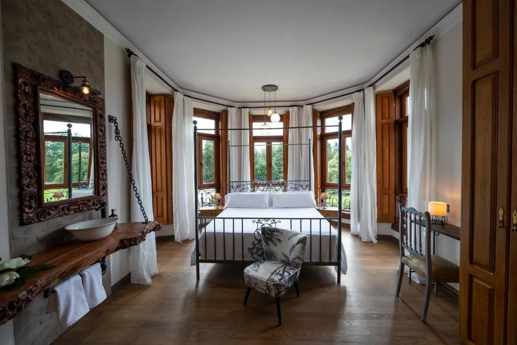 Suite avec baignoire spa et grand lit — POSADA SEMILLA