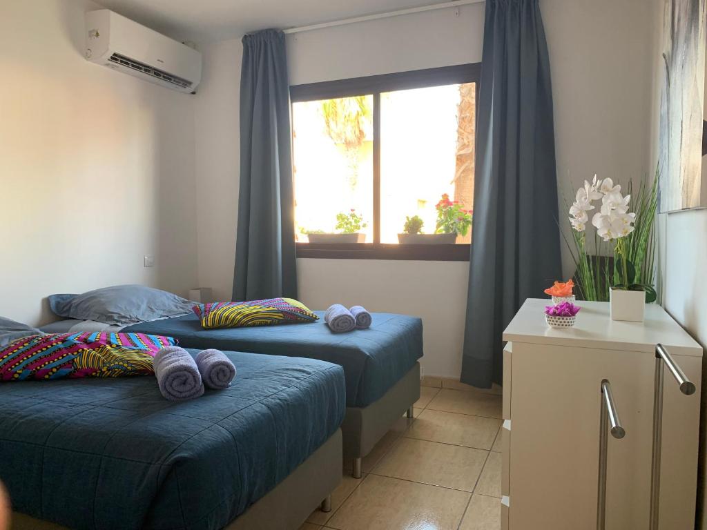 Private Bedroom in a Host's Home with Shared Pool