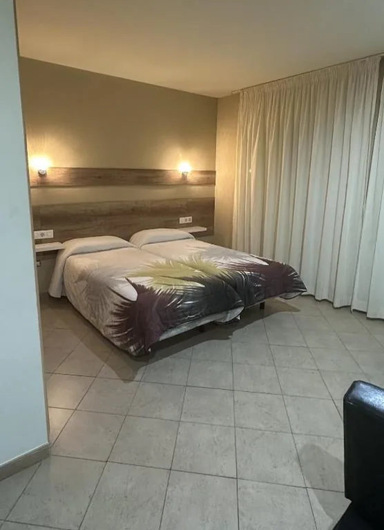 Estudio Triple Estándar — RAQUEL'S - Habitacions i Apartaments turístics -