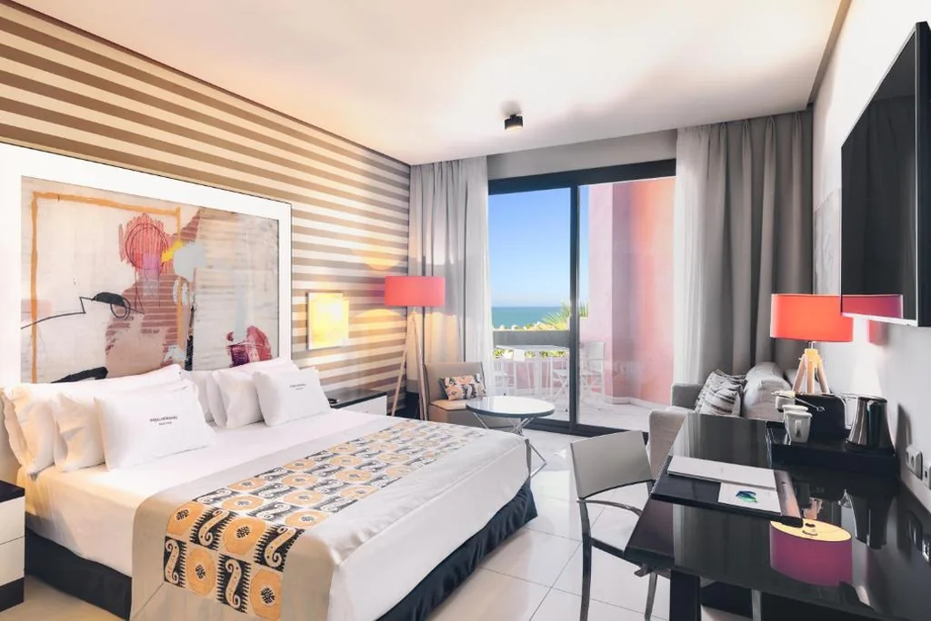 Deluxe tweepersoonskamer met zijdelings zeezicht (2 volwassenen + 1 kind) - 1 of 2 bedden — Royal Hideaway Sancti Petri