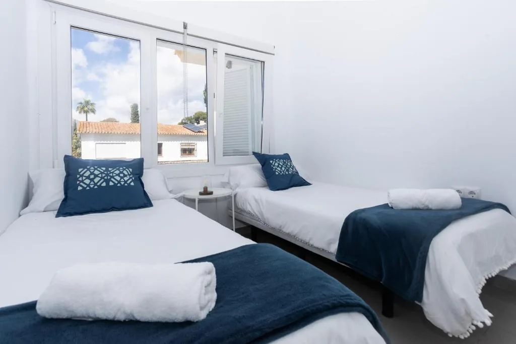 带共用浴室的双床间 — San Miguel 34 Rooms