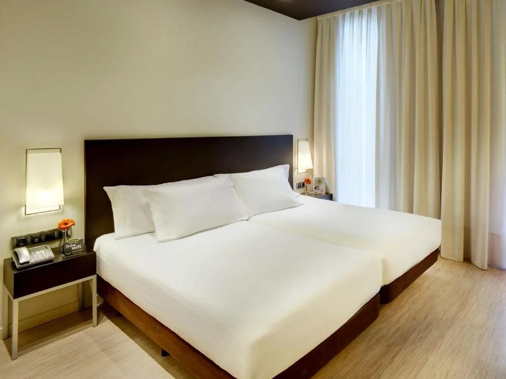 Suite Junior Cuádruple — Sercotel Boulevard Vitoria-Gasteiz