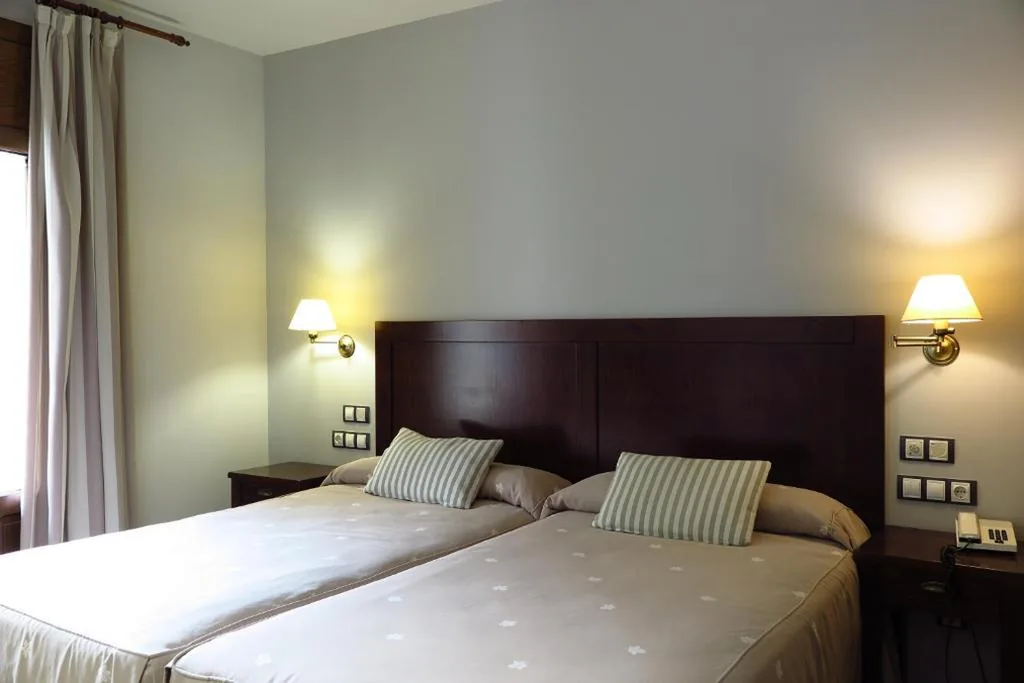 Superior Single Room with Balcony — SNÖ Hotel Bielsa