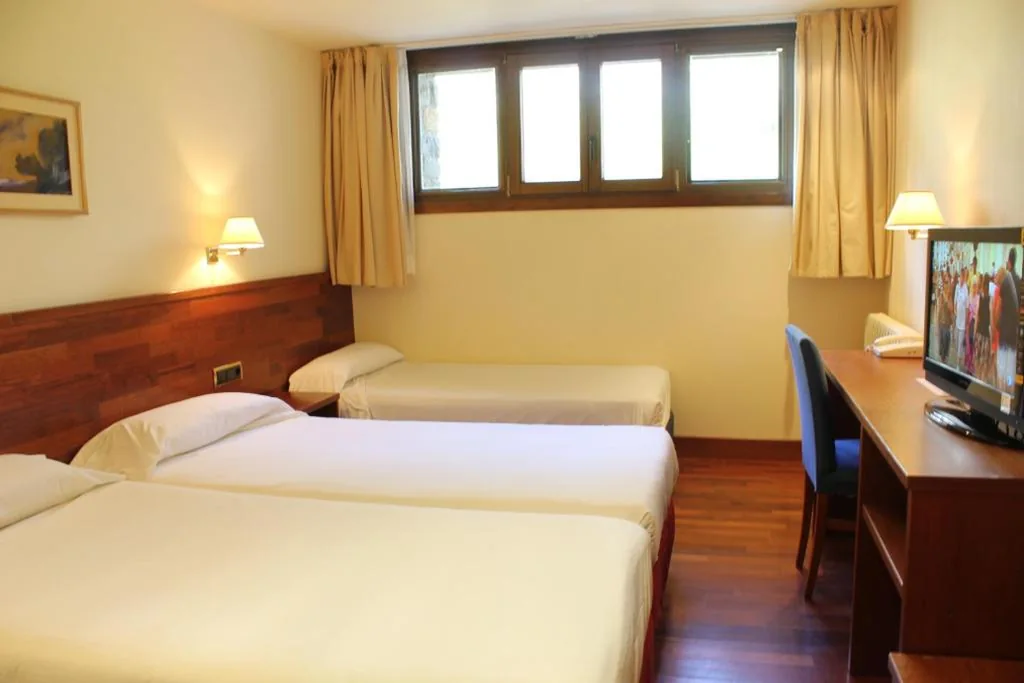 Habitación Triple — SNÖ Hotel Candanchú