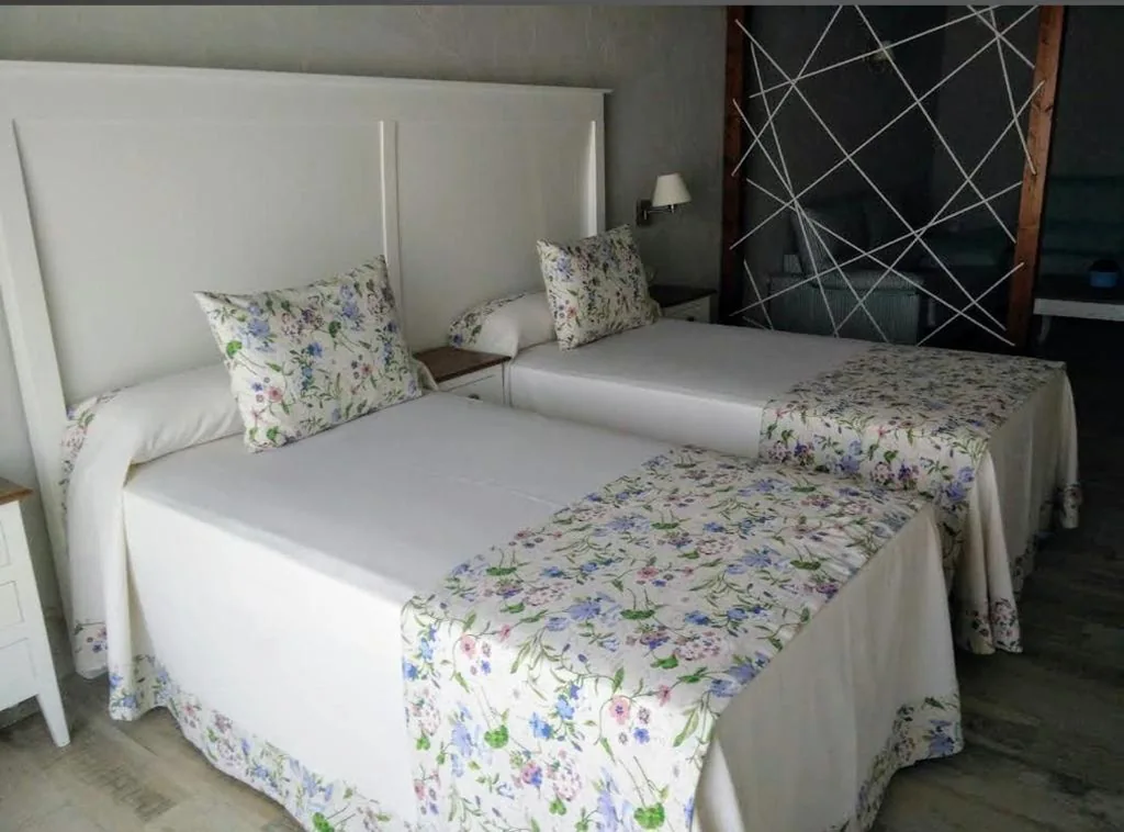 Suite con vista sul giardino — Suites BELLAHELLIN