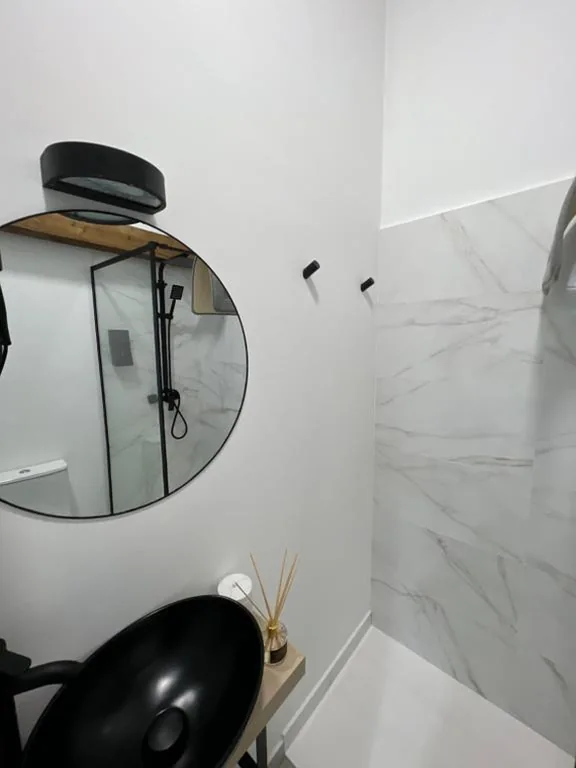 Deluxe Quadruple Room — SUITES CHIC