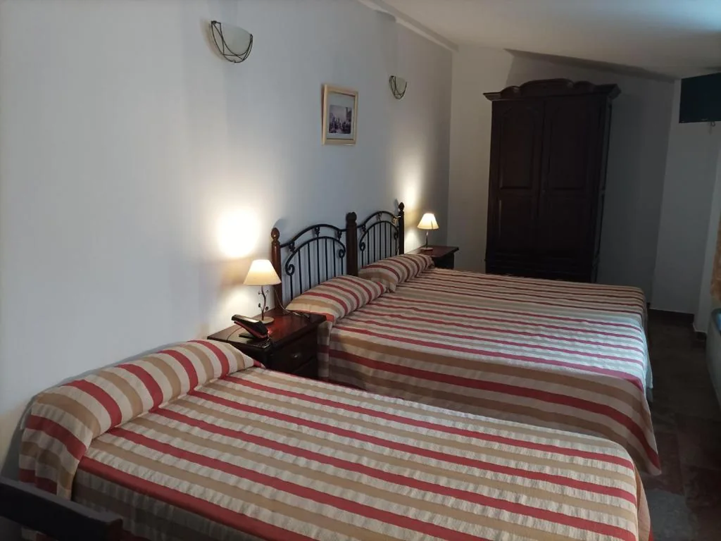 Quarto Triplo — Suites San Cayetano