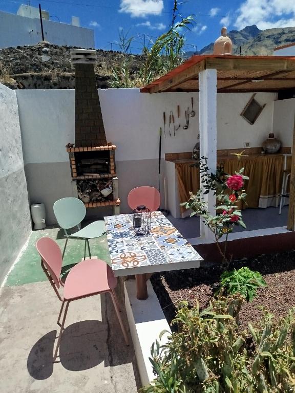 Susa and Pepe garden and house