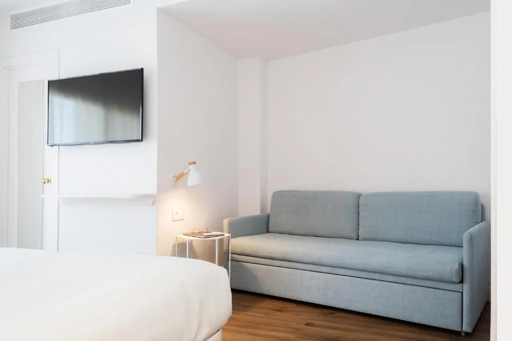 Habitación Cuádruple Confort — The 15th Boutique Hotel