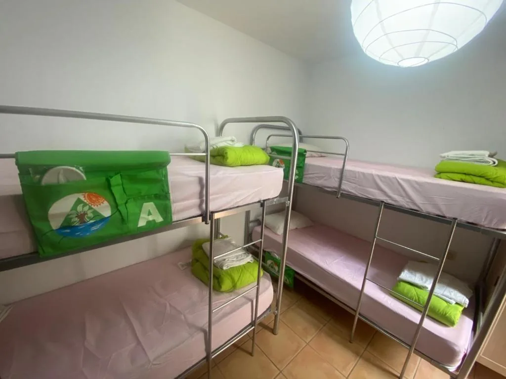 Lit dans un dortoir mixte de 4 lits — The Best House Tenerife Habitaciones Compartidas