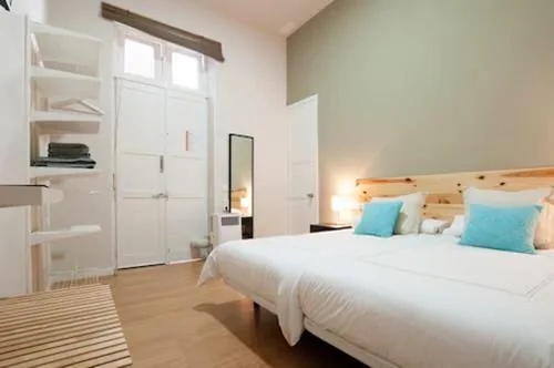 Habitación Doble con baño privado - 1 o 2 camas — Triana 103 Rooms & Suites