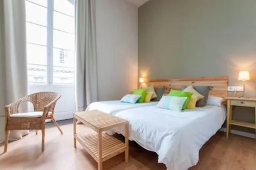 Habitación Doble Deluxe - 2 camas — Triana 103 Rooms & Suites