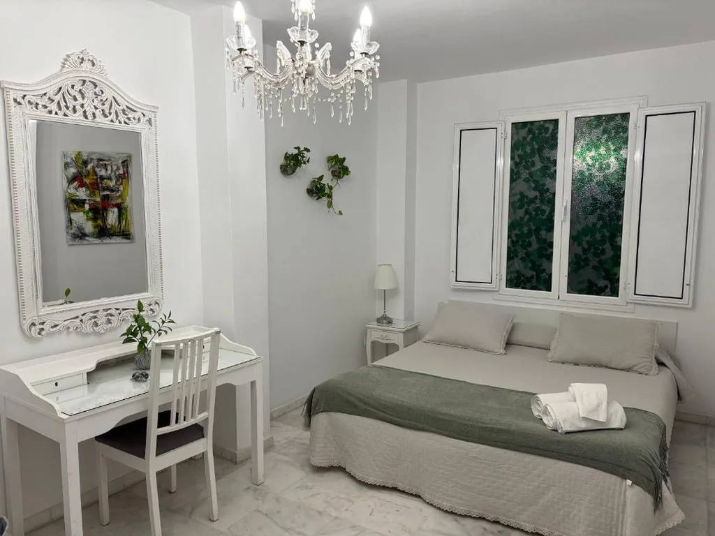Habitación Doble Deluxe — Un Patio al Sur