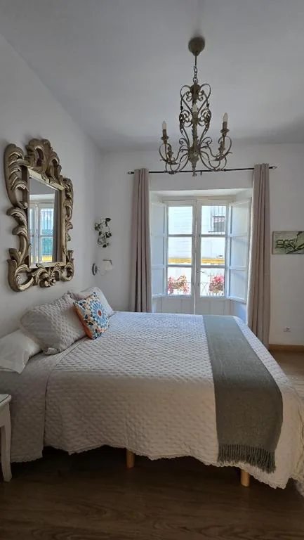 Habitación Doble Superior — Un Patio al Sur