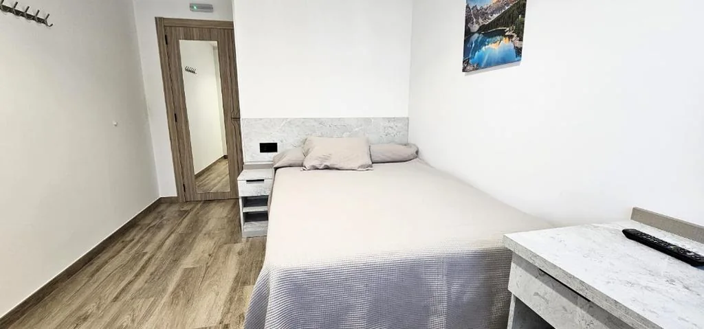 Standaard tweepersoonskamer met gedeelde badkamer — Vacansis Santiago Garcia Prieto y Romero Donallo Habitaciones Privadas