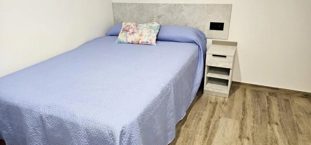 Standaard tweepersoonskamer met gedeelde badkamer — Vacansis Santiago Garcia Prieto y Romero Donallo Habitaciones Privadas