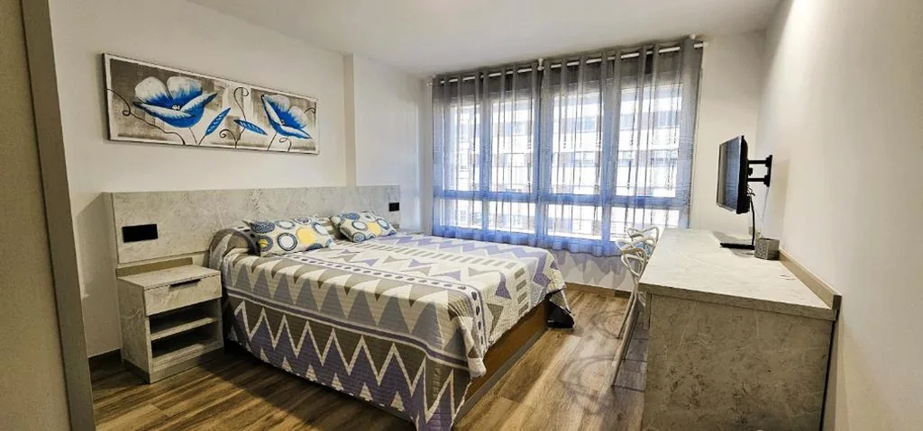 Standaard tweepersoonskamer met gedeelde badkamer — Vacansis Santiago Garcia Prieto y Romero Donallo Habitaciones Privadas