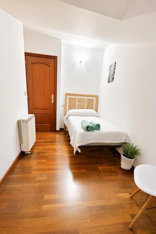 Eenpersoonskamer met gedeelde badkamer — Vacansis Santiago Garcia Prieto y Romero Donallo Habitaciones Privadas