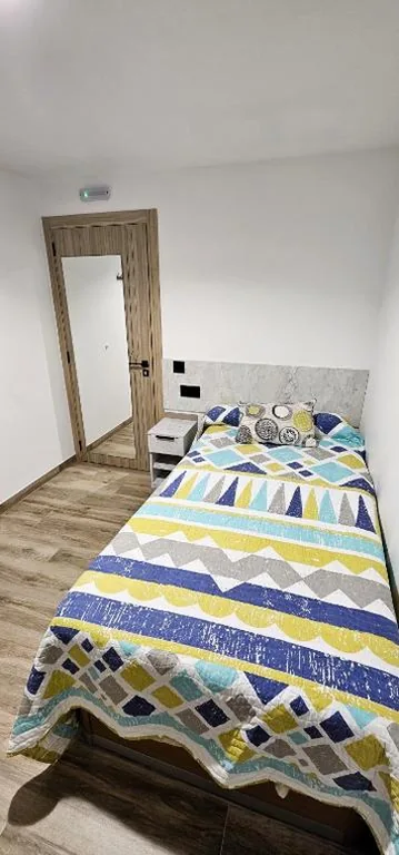 Standaard eenpersoonskamer met gedeelde badkamer — Vacansis Santiago Garcia Prieto y Romero Donallo Habitaciones Privadas