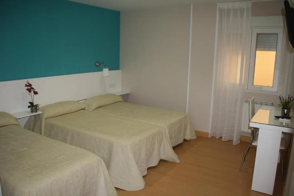 Habitación Doble con cama supletoria - 1 o 2 camas — Verona