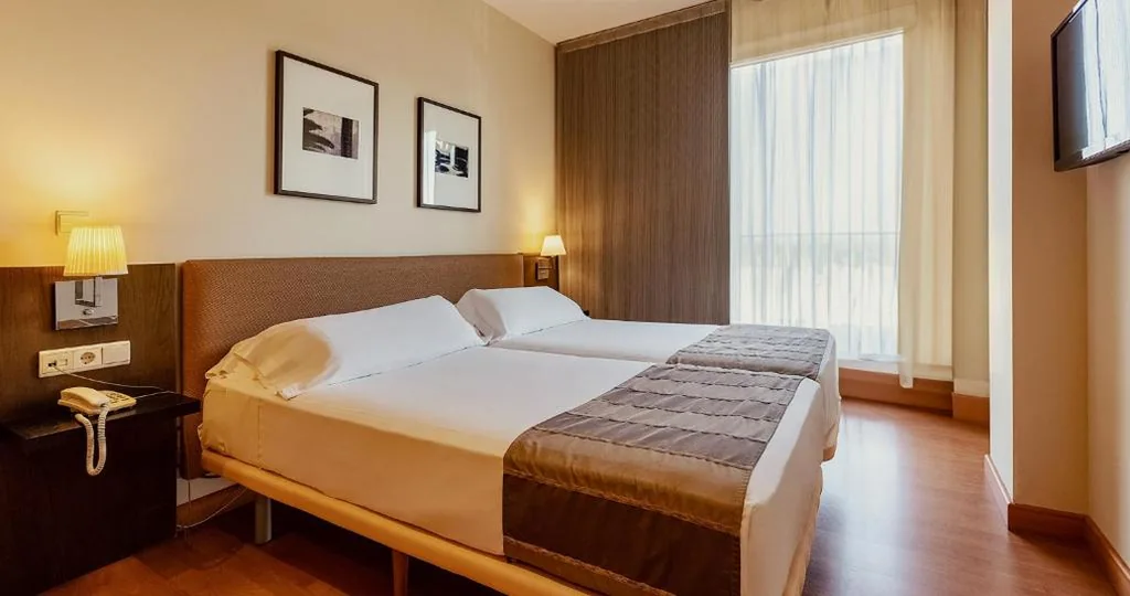 Habitación cuádruple — Vértice Sevilla