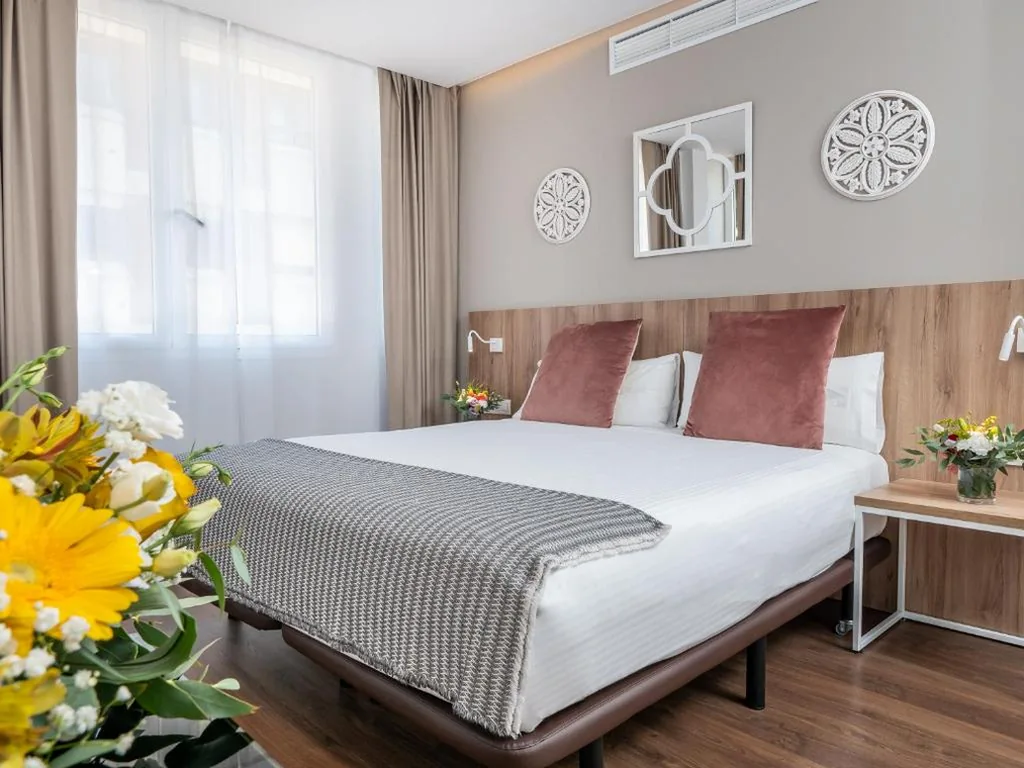 Habitación Familiar con baño privado — Vilana Hotel Boutique