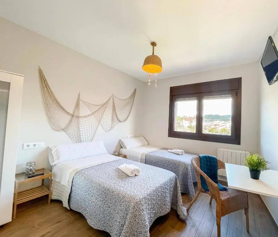 Habitación Familiar con vistas al jardín — Villa Galicia