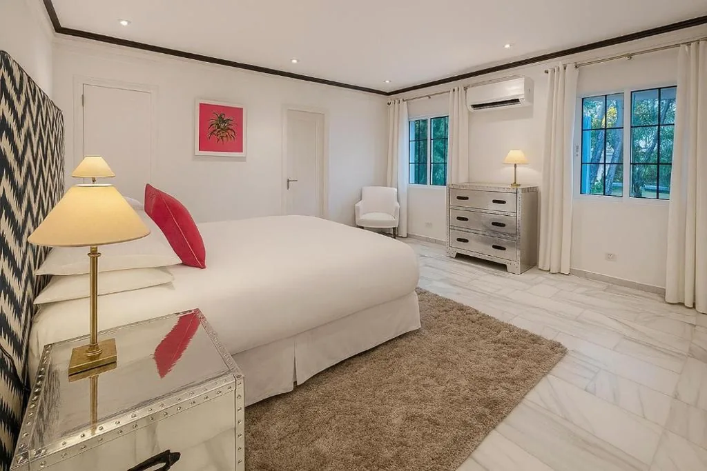 Villa in palm tree plantation, near the beach.