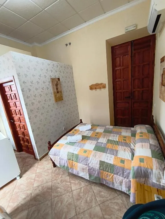 Driepersoonskamer met eigen badkamer — Villa Manolita