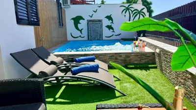 Villas Puerto Rico in front of the shopping center with private heated saltwater pool with jacuzzi function & arcade games — foto 12
