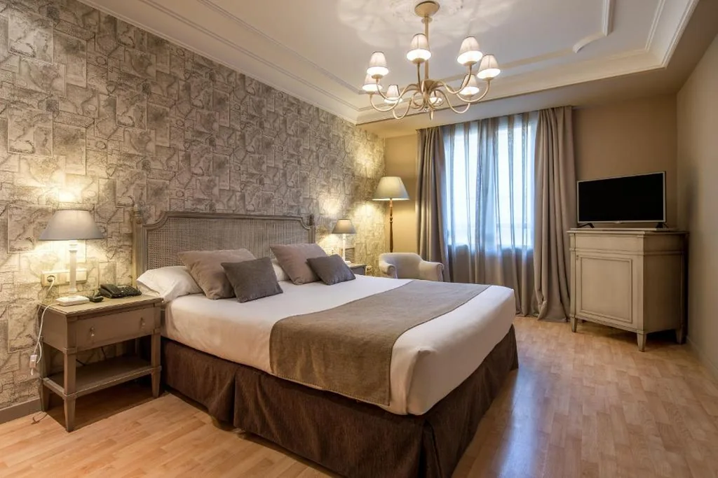 Quarto Vincci com cama extra — Vincci Lys