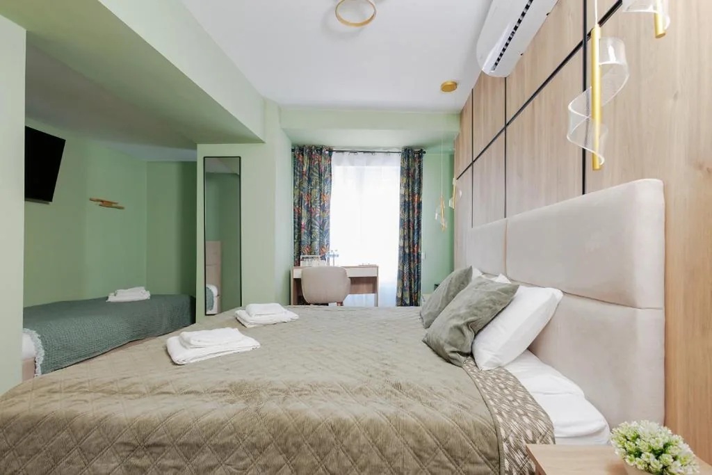 Chambre Triple avec salle de bains privative — Vita Verde